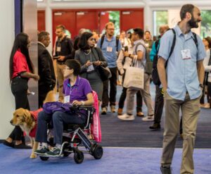 ASHG Meeting Attendee entering the Exhibit Hall