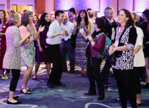 Attendee enjoying the festivites at the Annual meeting reception