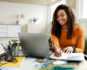 Young Woman on computer on a webinar.