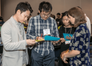 ASHG Meeting Attendees interacting at Networking event